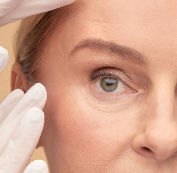 Close-up of a woman during a brow lift consultation