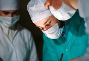 Surgeon and staff during a procedure