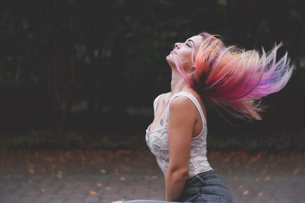 Beautiful woman with colorful hair